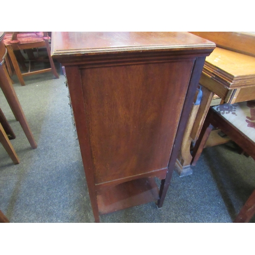 1085 - A mahogany five drawer music cabinet with undertier on castors, 83cm high x 52cm wide x 38cm deep