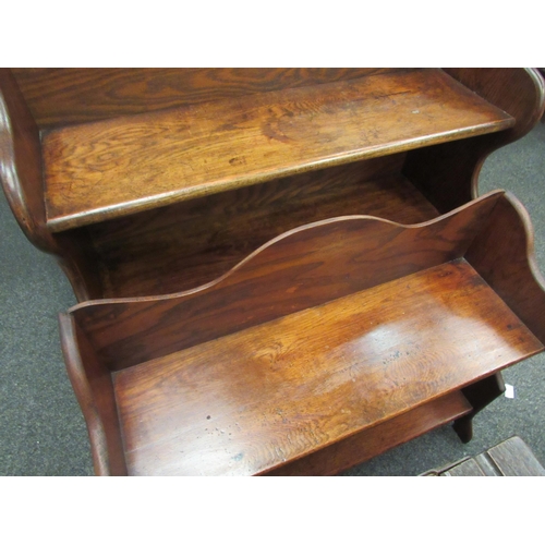 1094 - Two pegged oak graduated bookshelves with serpentine backs, largest 91.5cm x 76cm x 25cm   (R)   £80