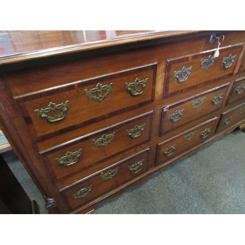 1101 - A 19th Century mahogany false front chest of three lower drawers with lift-up top and on bracket fee... 