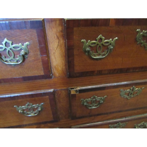 1101 - A 19th Century mahogany false front chest of three lower drawers with lift-up top and on bracket fee... 