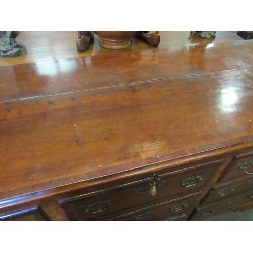 1101 - A 19th Century mahogany false front chest of three lower drawers with lift-up top and on bracket fee... 