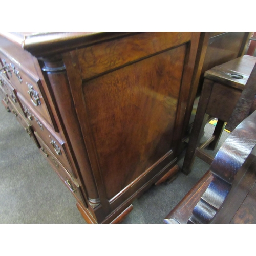 1101 - A 19th Century mahogany false front chest of three lower drawers with lift-up top and on bracket fee... 