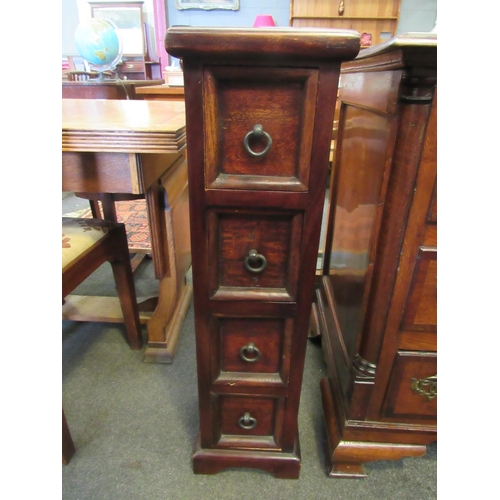 1102 - A modern side chair together with a bank of four drawers (2)