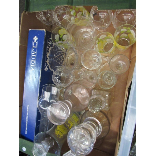 1182 - Two boxes of various glassware including decanters, drinking glasses, vases etc.