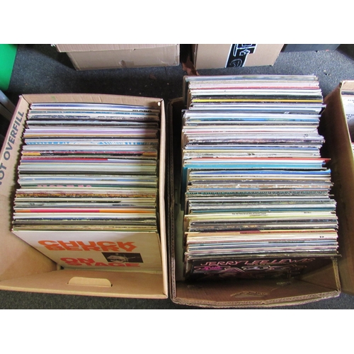 1187 - Four boxes of mixed LP's including Jerry Lee Lewis, Chuck Berry, Buddy Holly etc