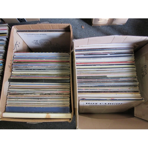 1187 - Four boxes of mixed LP's including Jerry Lee Lewis, Chuck Berry, Buddy Holly etc