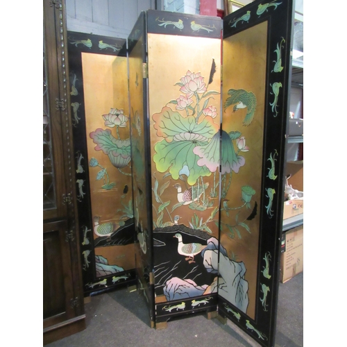 1189 - A Japanese style gilt and lacquered folding screen with scenes of wildlife, 183cm high   (R)  £70