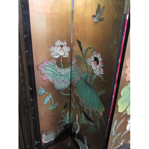 1189 - A Japanese style gilt and lacquered folding screen with scenes of wildlife, 183cm high   (R)  £70