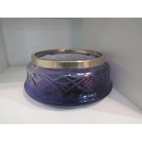 1375 - An art glass shallow form bowl and an amethyst glass fruit bowl