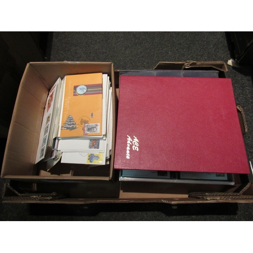 1400 - A box of first day covers and stamp albums