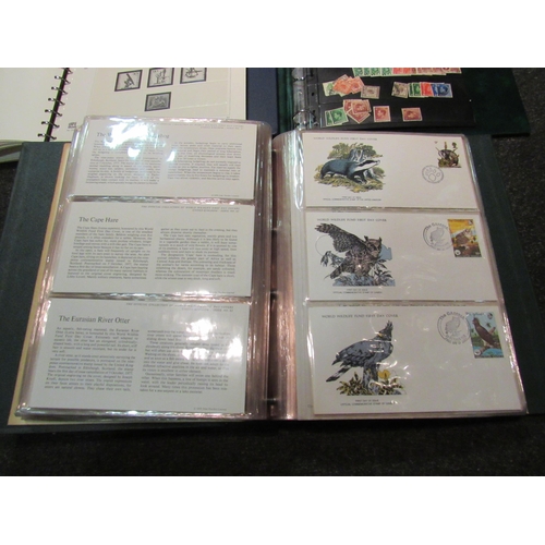 1419 - A box of stamp albums and first day covers to include large set of World Wildlife Fund FDA's and GB ... 