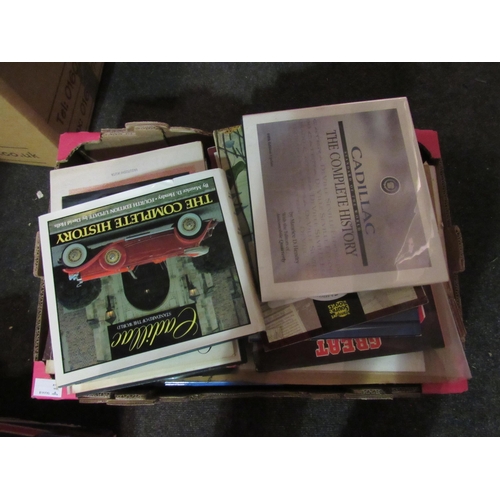 1438 - A box of mixed automobile books and manuals etc. including Cadillac