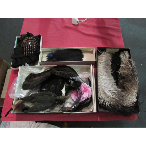 1439 - A box containing a quantity of linen and lace, ostrich feathers, gloves etc  (E)  £10-20