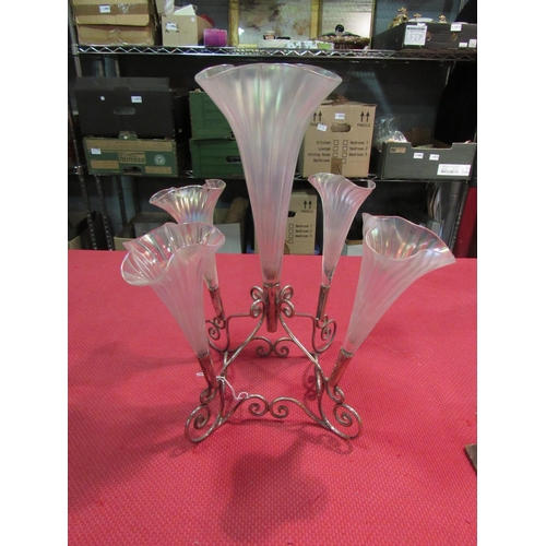 1457 - A white metal epergne with five trumpet shape vaseline glasses