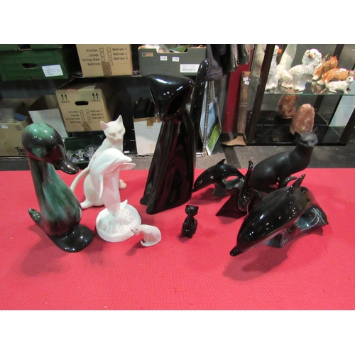 1460 - A selection of cat and dolphin figures including Counterpoint and a duck figure (11)   (E)  £15-20