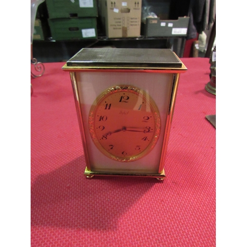 1462 - An Imhof eight day 15 jewel vintage brass carriage clock, stamped 135865 Swiss, wear to interior