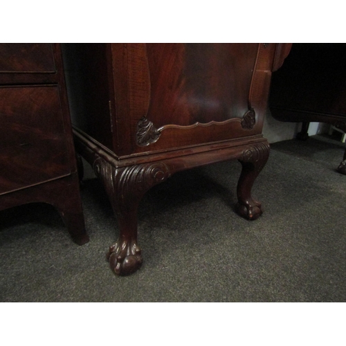 1008 - A 19th Century mahogany breakfront sideboard, with two central drawers flanked by two cupboards, one... 