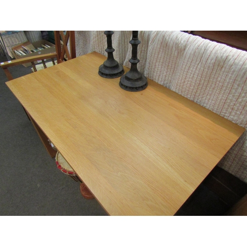 1138 - A light oak dining table, plain frieze, on square tapering legs, 76cm high x 120cm long x 70cm wide