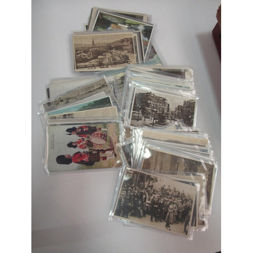 1317 - One album of mainly early 20th century bulldog postcards and one vacant album, loose examples includ... 