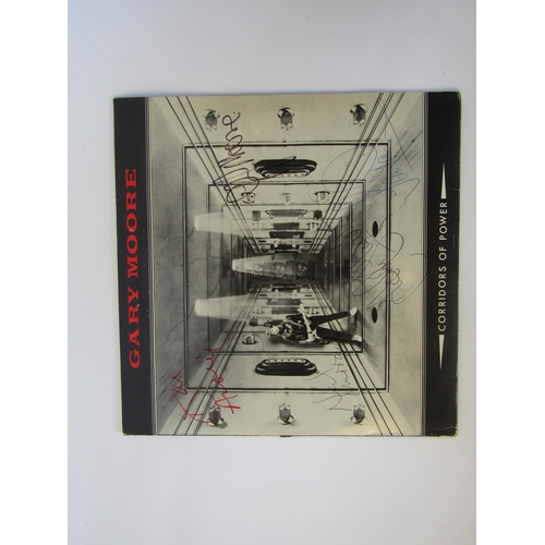 8007 - GARY MOORE: 'Corridors Of Power' LP (v2245, vinyl and sleeve VG), sleeve bearing autographs of Gary ... 