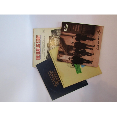 8027 - THE BEATLES: A group of four LP's to include 'The Beatles Story' (STBO 2222), 'Rarities' (PCM 1001) ... 