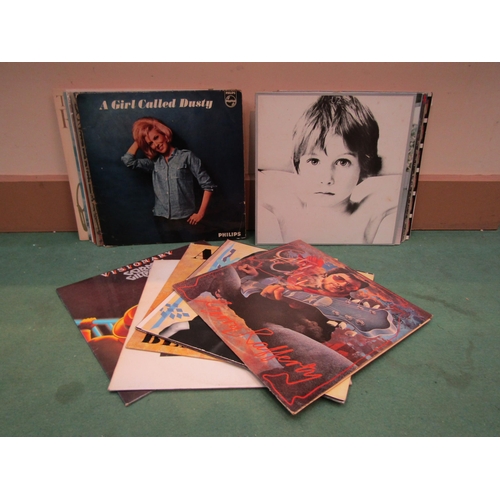 8050 - A collection of LP's to include U2, Lionel Richie, Boney M, The Motels, Robert Palmer, Pretenders, W... 