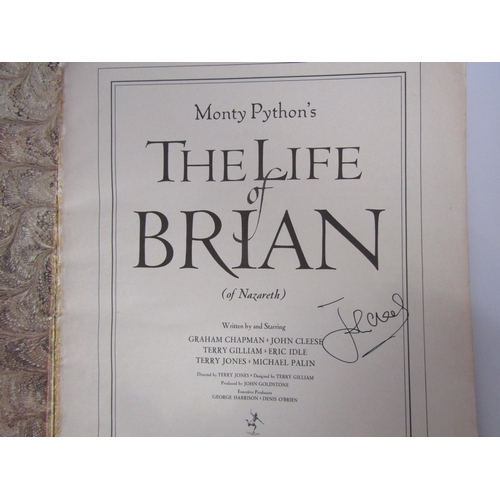 8124 - Assorted ephemera including Monty Python Life Of Brian Scrapbook bearing John Cleese signature, Omni... 