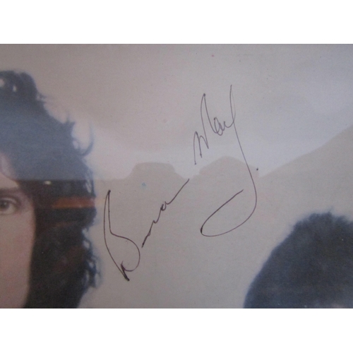 8130 - QUEEN: A framed and glazed 'Queen II' LP sleeve bearing a full set of band autographs; Freddie Mercu... 