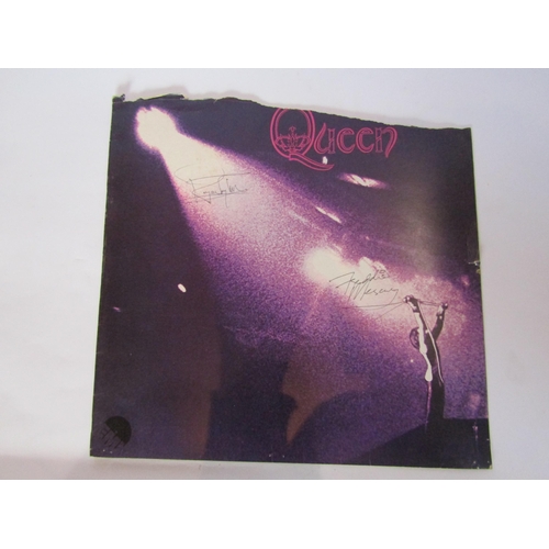 8131 - QUEEN: A 'Queen' LP sleeve bearing autographs of Freddie Mercury and Roger Taylor, the sleeve has be... 