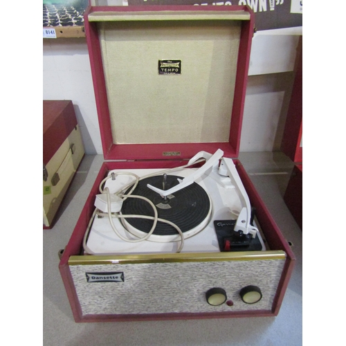 8166 - A vintage Dansette record player in pink    (E) £20-30