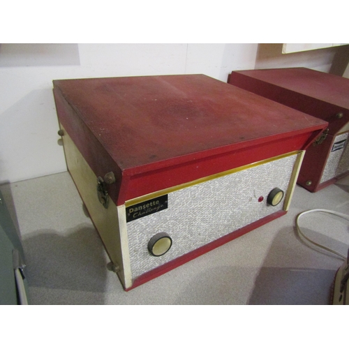 8169 - A vintage Dansette Challenge record player in red    (E) £20-30