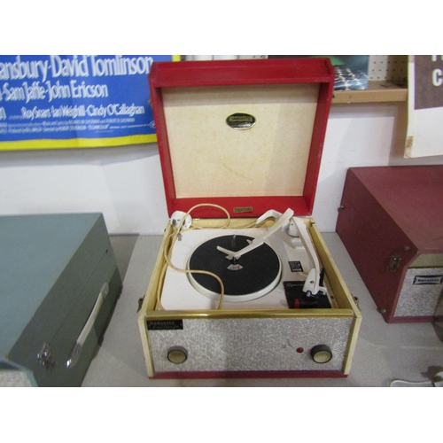 8169 - A vintage Dansette Challenge record player in red    (E) £20-30