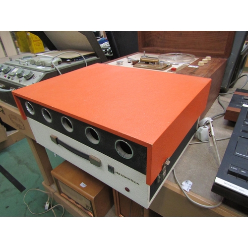 8183 - A vintage Elizabethan Astronaut record player in orange and cream