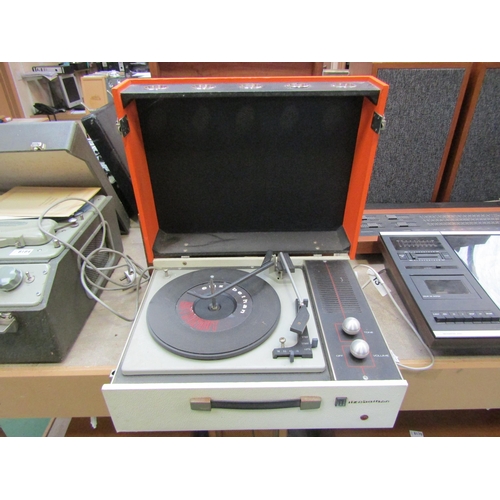 8183 - A vintage Elizabethan Astronaut record player in orange and cream