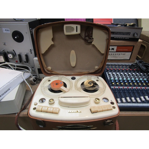 8202 - A Uher portable reel to reel tape recorder