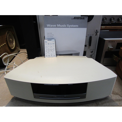 8204 - A Bose Wave Music System with remote control