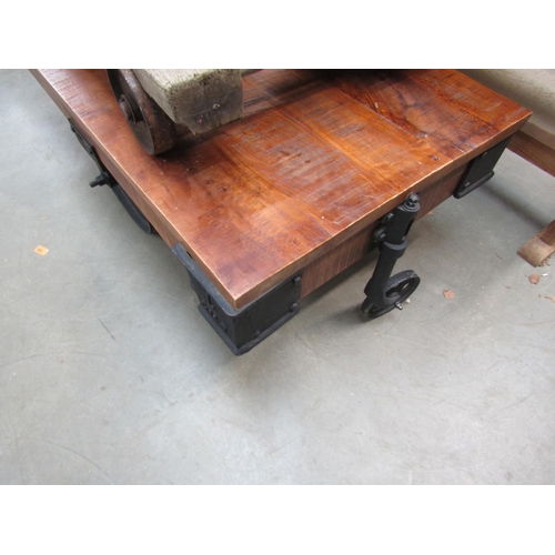 2049 - An industrial four wheel flat bed trolley coffee table 135 x 69cm