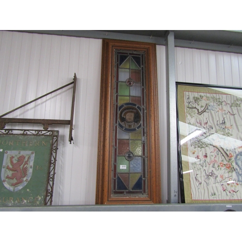 2131 - A pair of lead glazed window panels with Henry VIII and Queen Elizabeth I portaits to roundels