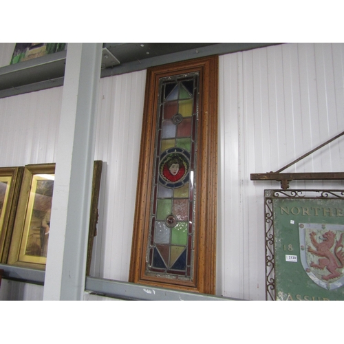 2131 - A pair of lead glazed window panels with Henry VIII and Queen Elizabeth I portaits to roundels