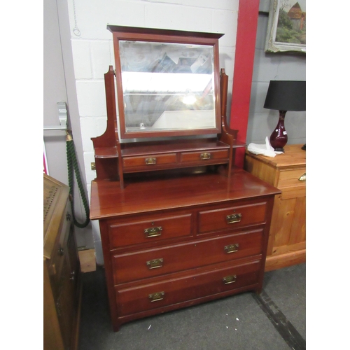 1082 - An Edwardian mahogany dressing chest, the tilt mirror over six drawers, 165cm high x 106cm wide x 52... 