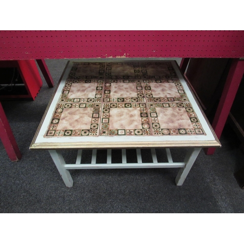 1142 - A tile top coffee table with undertier, 69cm x 69cm   (E) £5-10 Blyth Barn