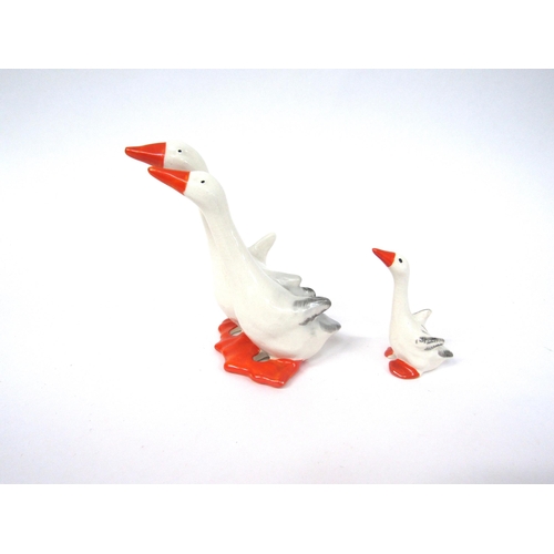 1871 - A Beswick pair of Geese in gloss, model no. 820 together with a Beswick Gosling in gloss, model no. ... 