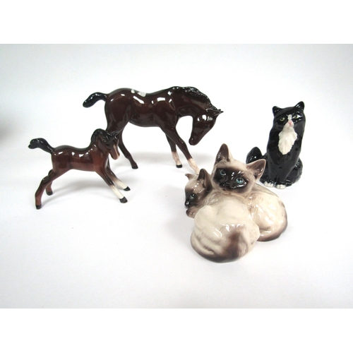 1909 - A Beswick large Foal in brown gloss, model no. 947, Beswick small Foal, model no. 815, Beswick Siame... 