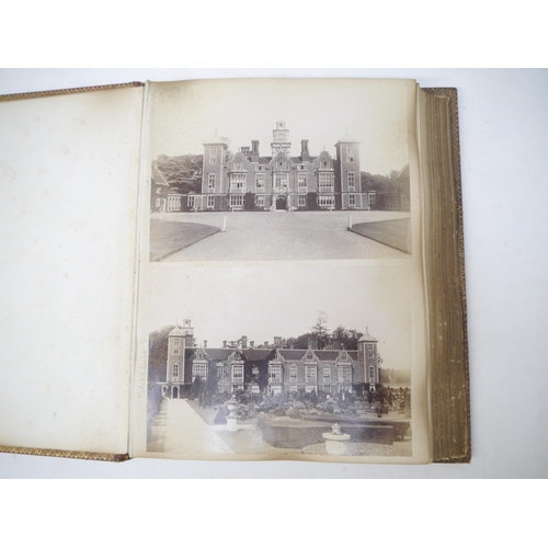 9101 - A late 19th Century photograph album containing 60+ mounted albumen print photographs, mainly UK and... 