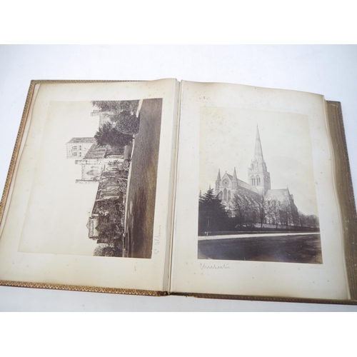 9101 - A late 19th Century photograph album containing 60+ mounted albumen print photographs, mainly UK and... 