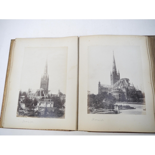 9101 - A late 19th Century photograph album containing 60+ mounted albumen print photographs, mainly UK and... 