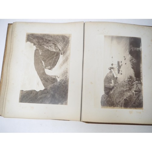 9101 - A late 19th Century photograph album containing 60+ mounted albumen print photographs, mainly UK and... 