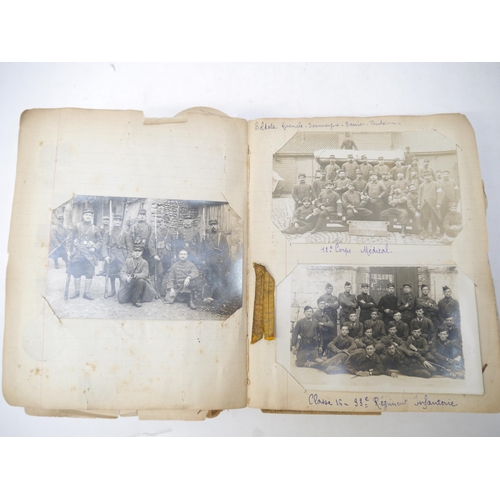 9105 - A World War 1 souvenir album containing photographs, postcards, manuscript pen & ink sketches and en... 