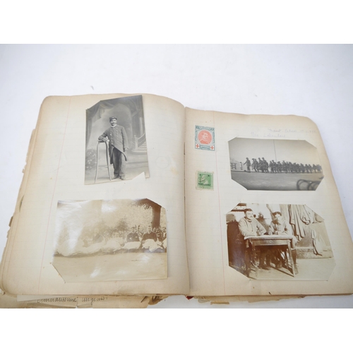 9105 - A World War 1 souvenir album containing photographs, postcards, manuscript pen & ink sketches and en... 