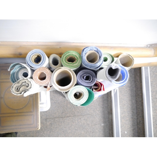 9215 - (Bookbinding), Fifteen rolls of Reliance bookbinding bookcloth, varying amounts left on each roll, v... 